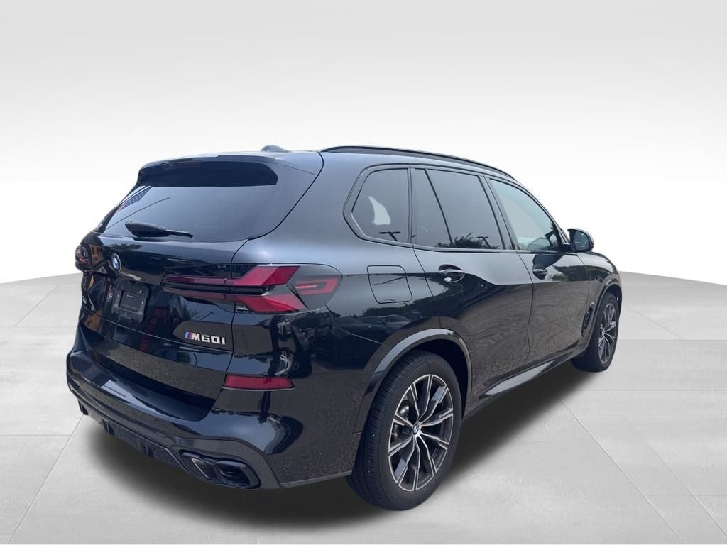 Used 2024 Black Sapphire Metallic BMW M60i image 3