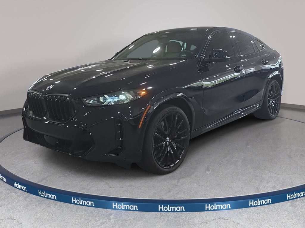 Certified Used 2024 Black BMW xDrive40i image 1