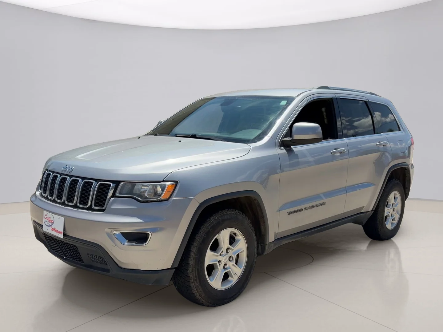 Used 2017 Silver Jeep LAREDO image 1
