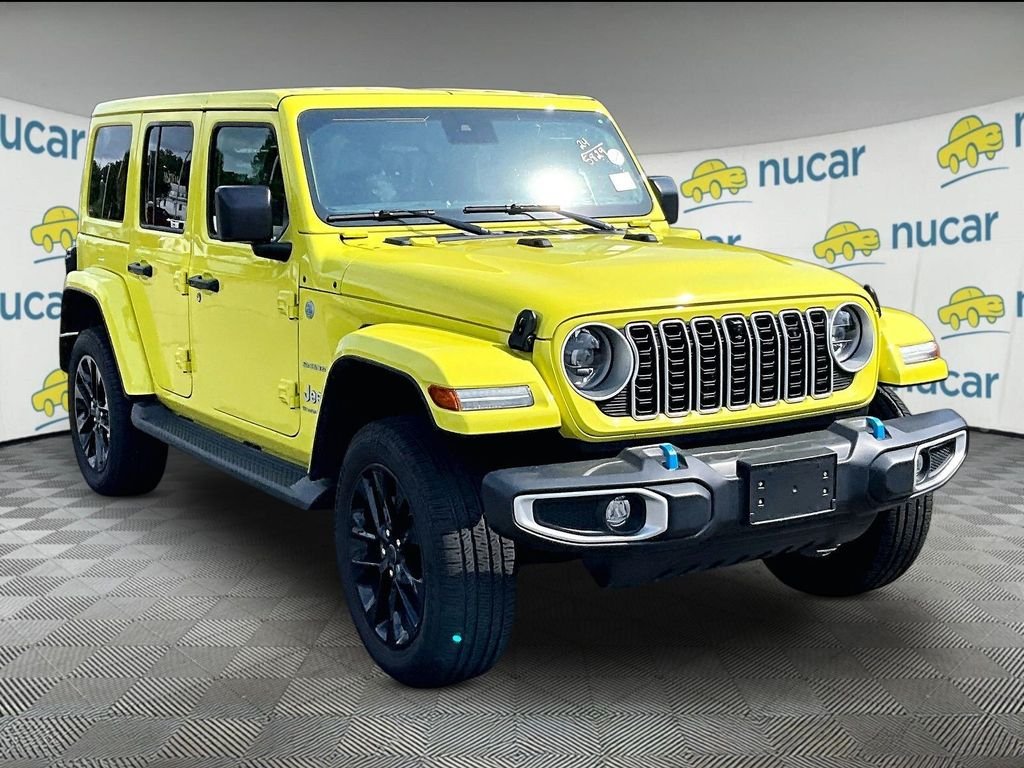 Used 2024 Yellow Jeep Sahara 4xe image 1