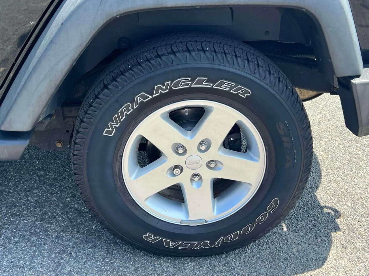Used 2015 Black Clearcoat Jeep Sport image 9