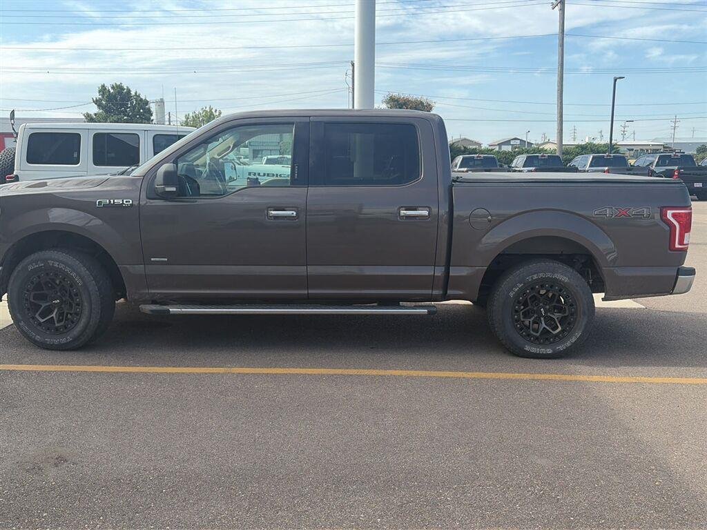 Used 2015 Ford F-150 XLT with VIN 1FTEW1EP8FKE40013 for sale in Garden City, KS