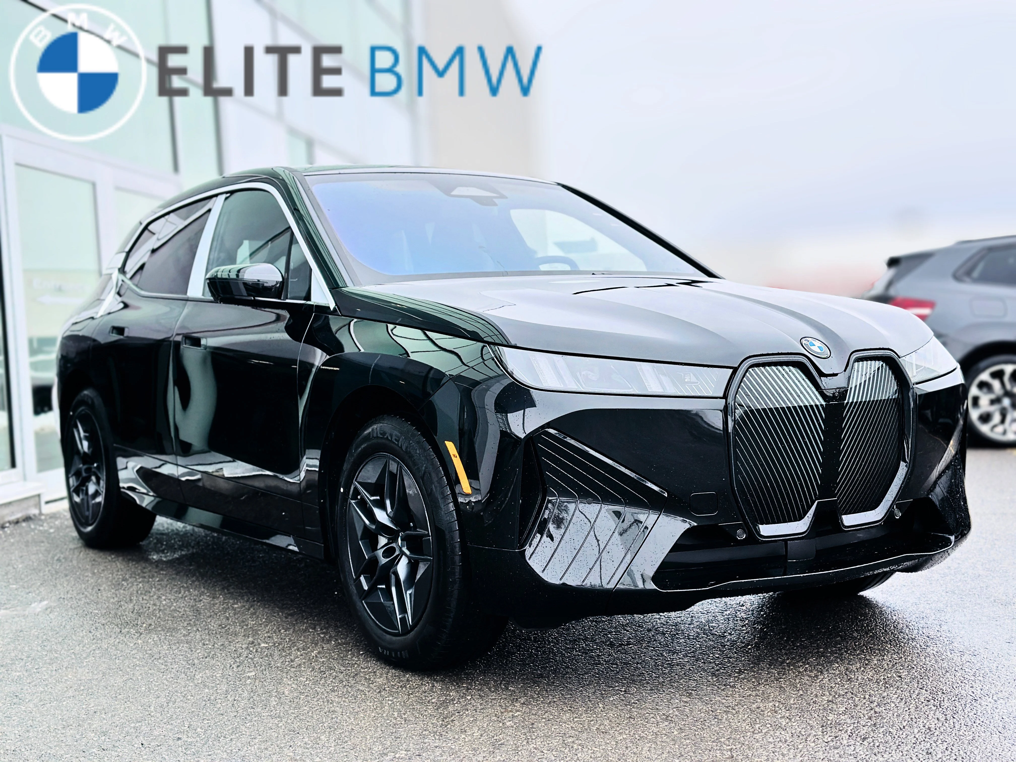 Used 2026 BLACK SAPPHIRE METALLIC BMW XDRIVE60 image 9