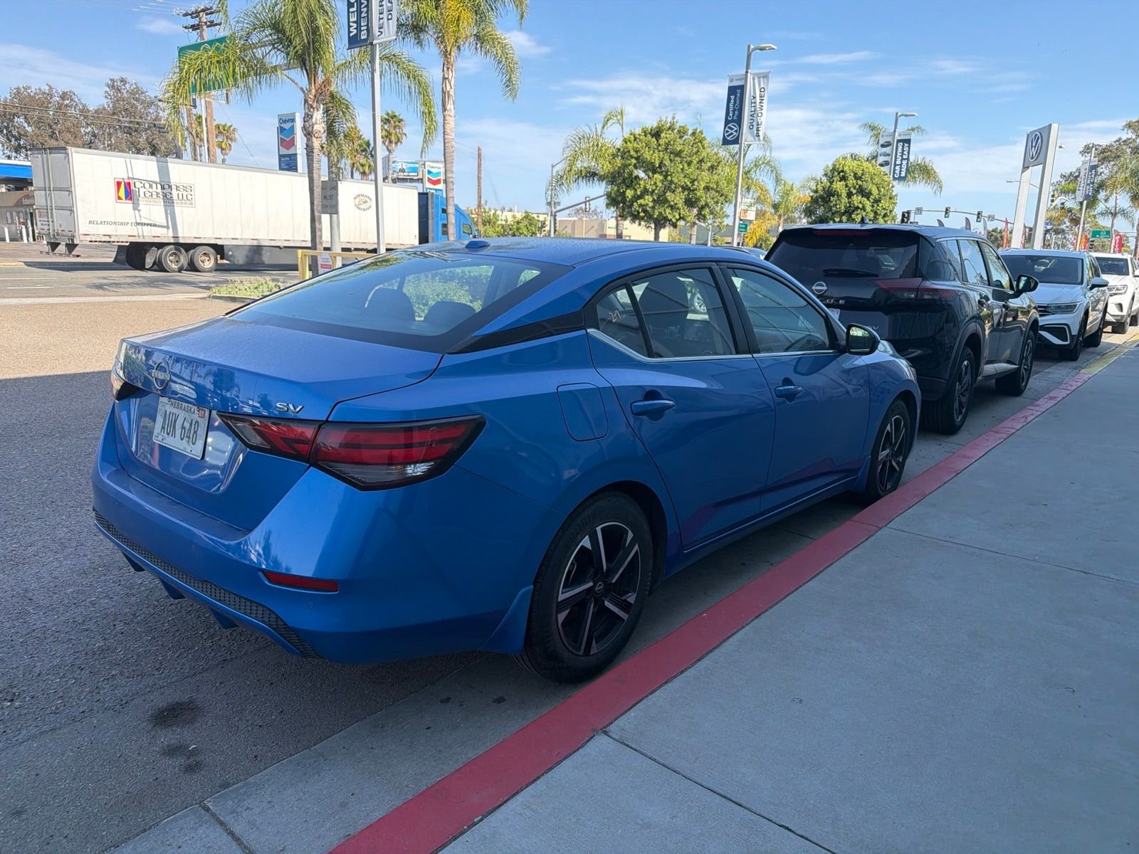 Used 2024 Electric Blue Metallic Nissan SV image 5