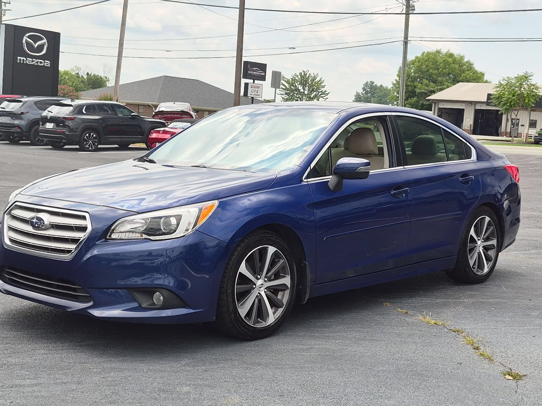 Used 2015 Lapis Blue Pearl Subaru 2.5i Limited image 1