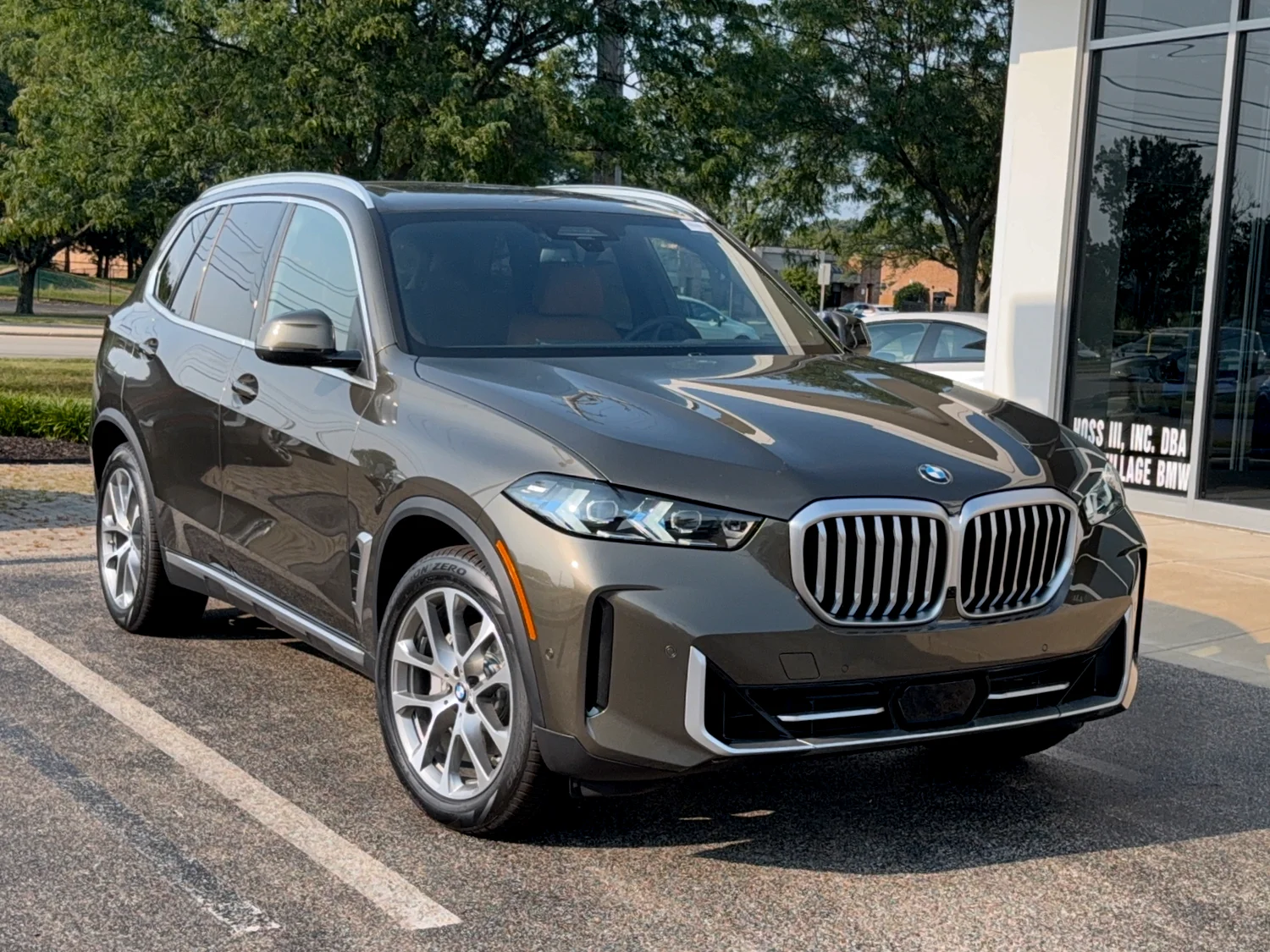 New 2026 Manhattan Green Metallic BMW xDrive40i image 1