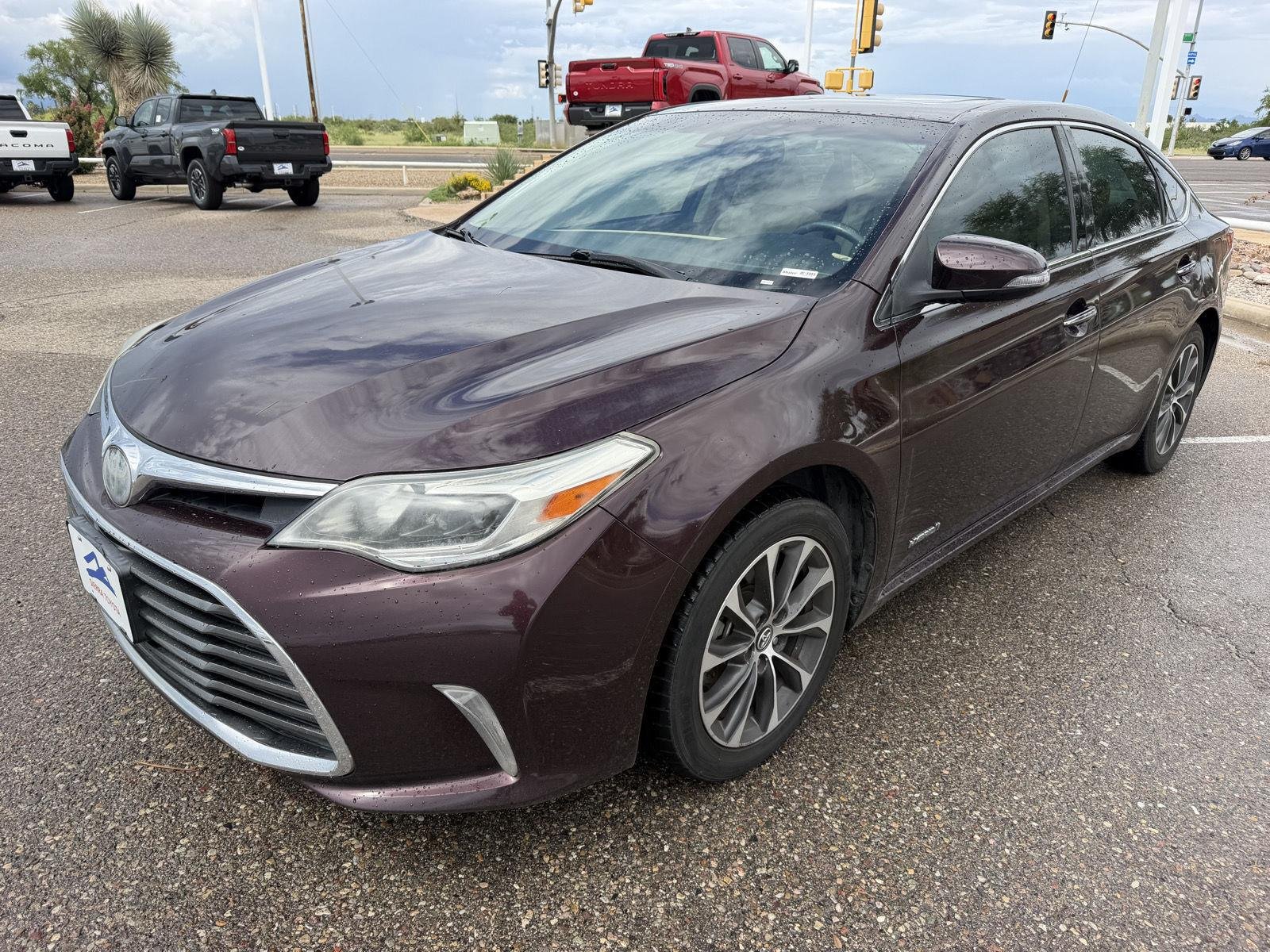 Used 2018 Sizzling Crimson Mica Toyota Hybrid XLE Premium image 1