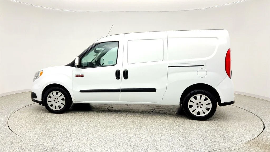 Used 2018 Bright White Ram Tradesman SLT Van w/ ParkSense & Commercial Shelving image 8