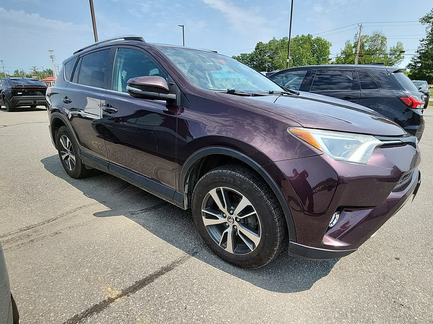 Used 2016 Black Currant Metallic Toyota XLE image 4
