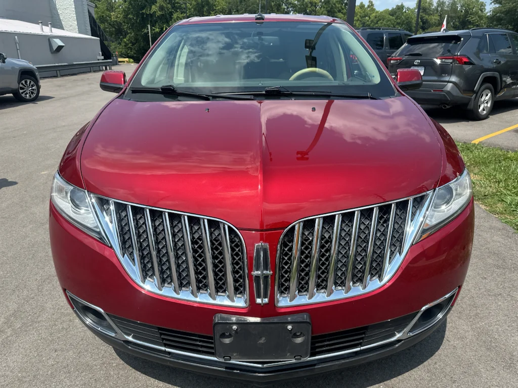 Used 2014 Ruby Red Metallic Tinted Clearcoat Lincoln Base image 2