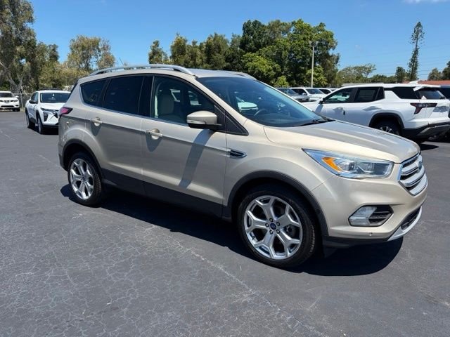 Used 2018 Gold Ford Titanium image 1