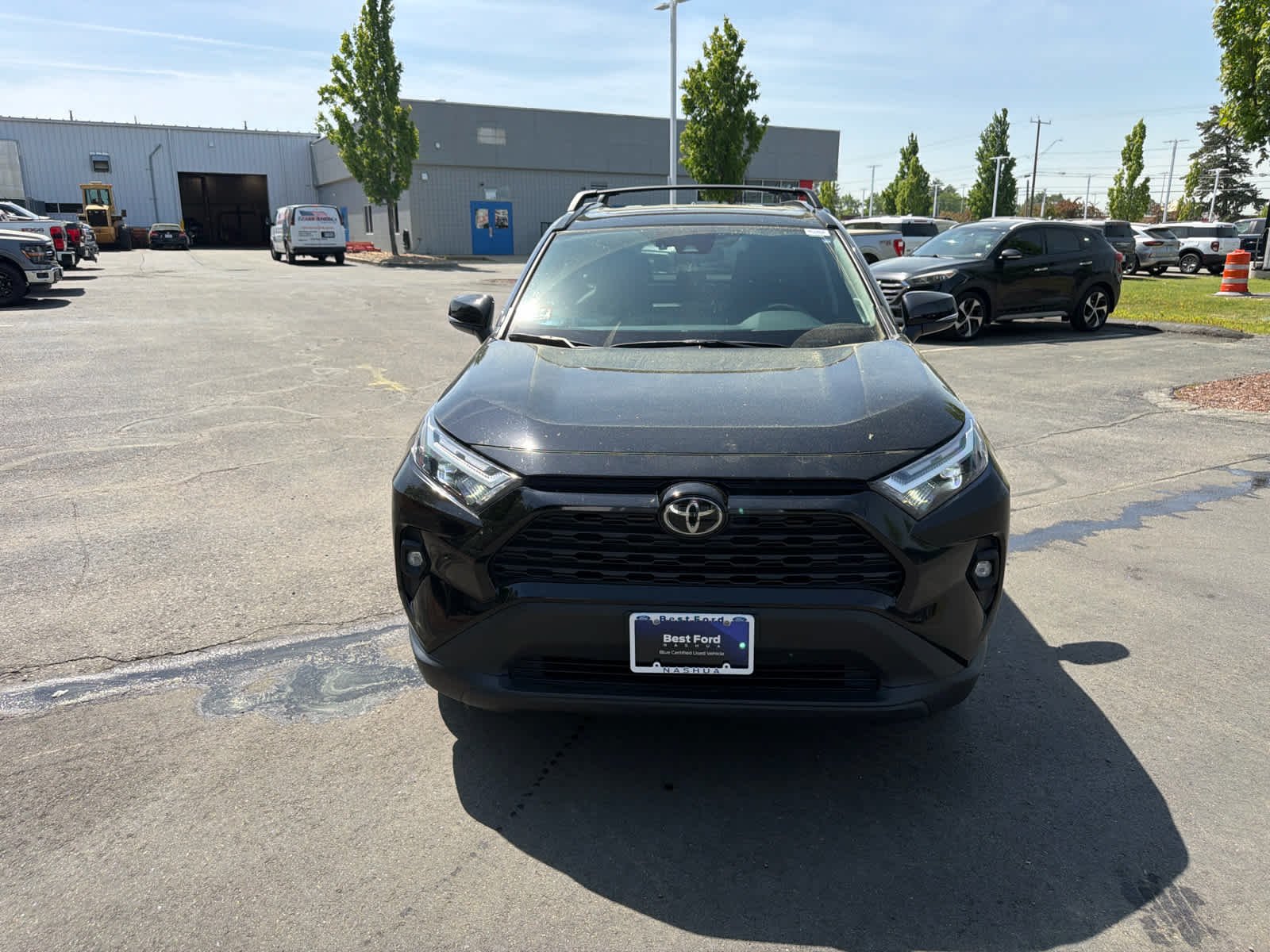 Used 2024 Midnight Black Metallic Toyota XLE Premium image 2
