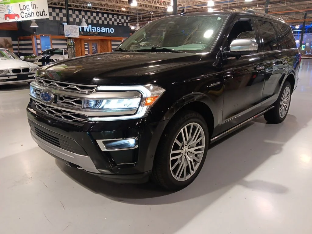Used 2024 Black Metallic Ford Platinum image 1