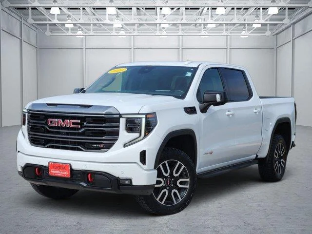 Used 2024 Summit White GMC AT4 4x4 Crew Cab 5.75 ft. box 147.4 in. WB image 1