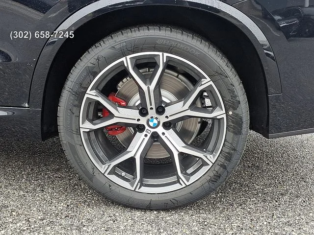 New 2026 Carbon Black Metallic BMW xDrive50e image 8