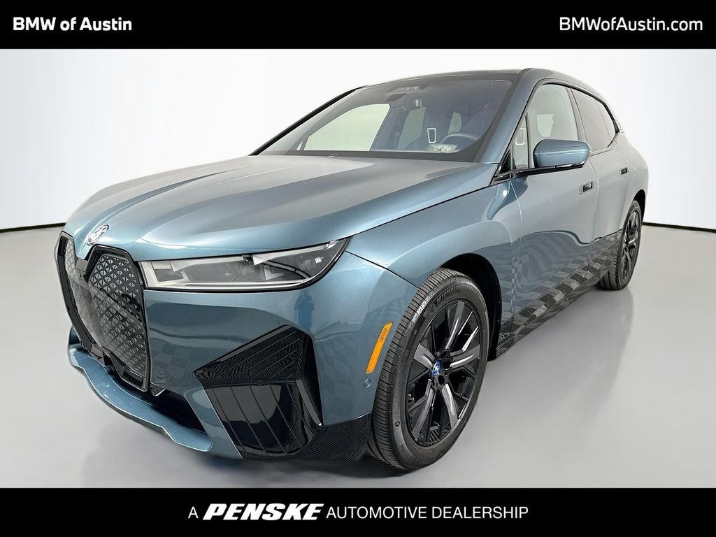 Certified Used 2024 Blue BMW xDrive50 image 1