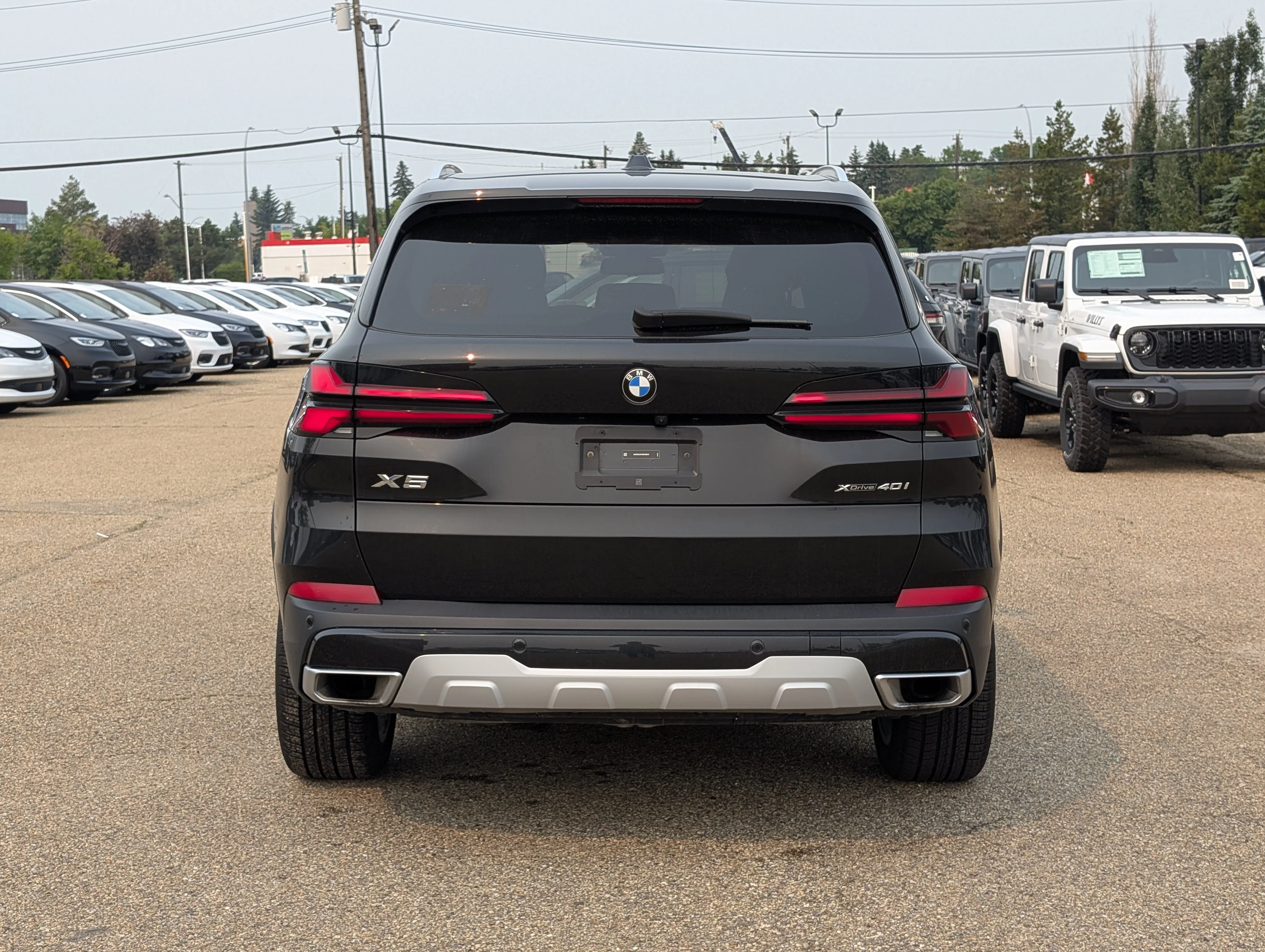 Used 2024 Black Sapphire Metallic BMW xDrive40i image 5