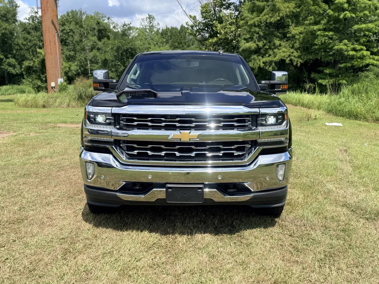 Used 2017 Black Chevrolet LTZ 4x4 4dr Crew Cab 6.5 ft. SB image 8