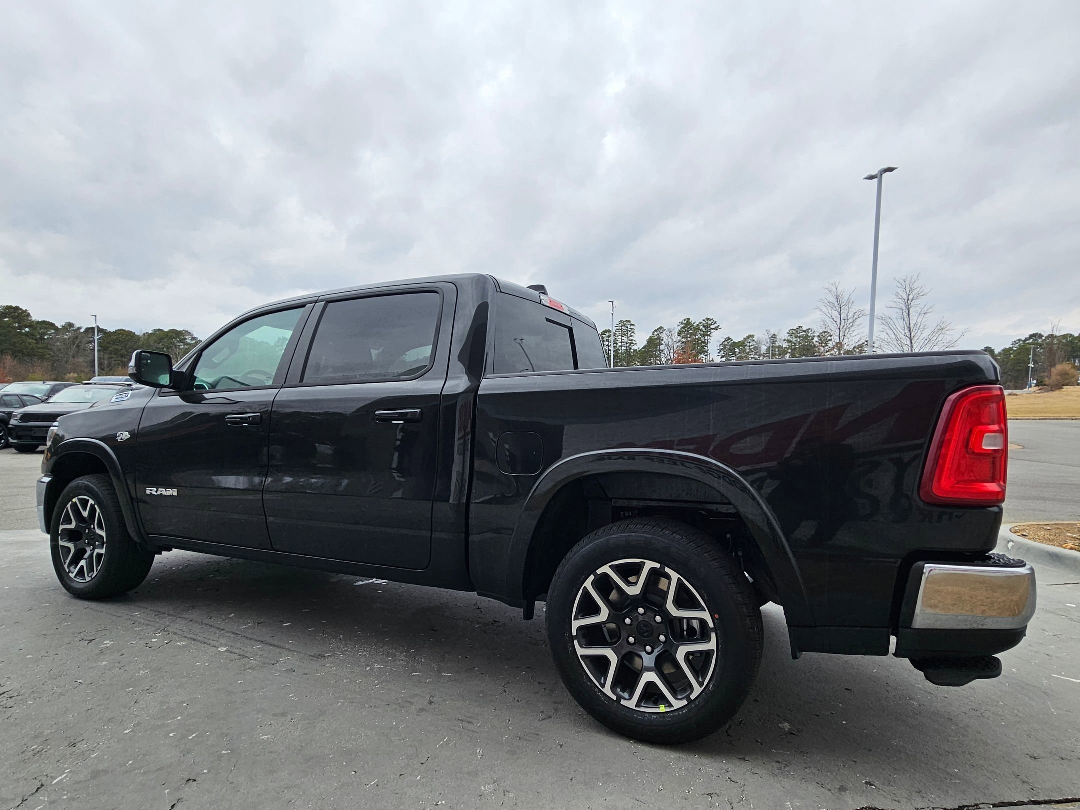New 2026 Diamond Black Crystal Pearl-Coat Exterior Paint RAM Laramie image 5