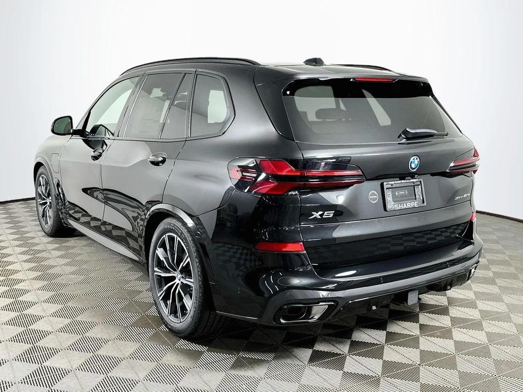 New 2026 Black Sapphire Metallic BMW xDrive50e image 7