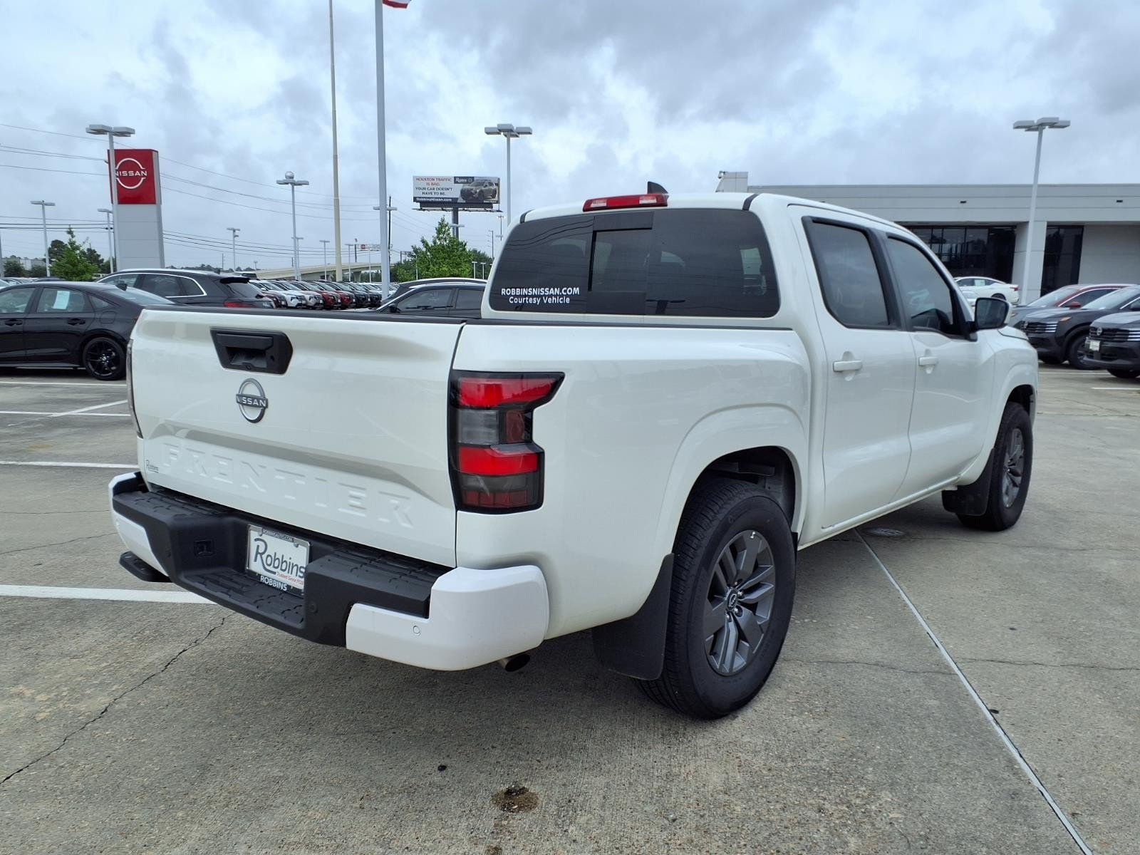 2026 Nissan Frontier SV White at Robbins Nissan