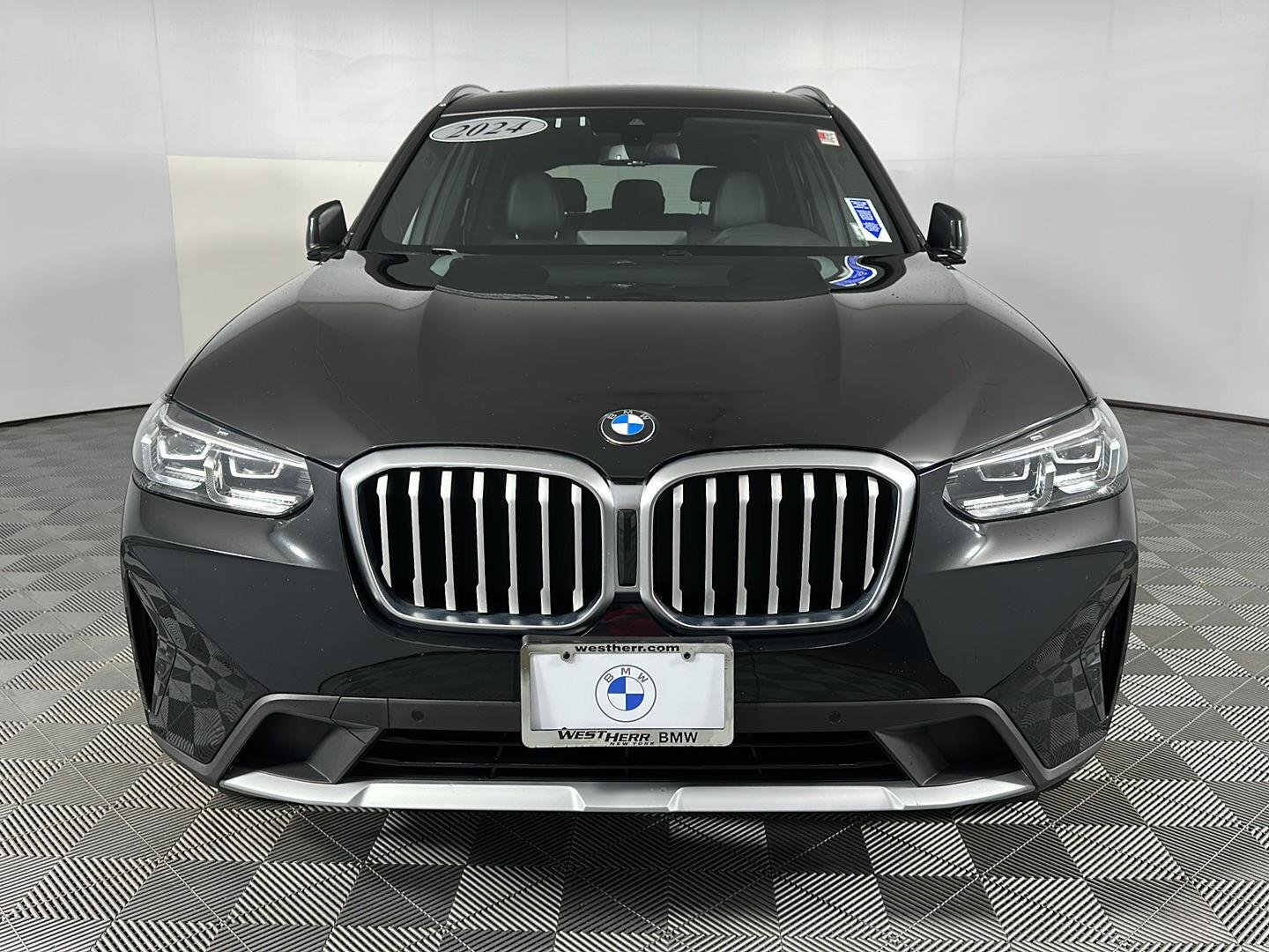 Used 2024 Black Sapphire Metallic BMW xDrive30i image 2