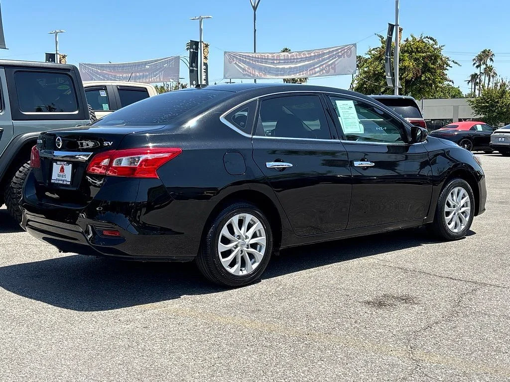 Used 2019 Super Black Nissan SV image 3