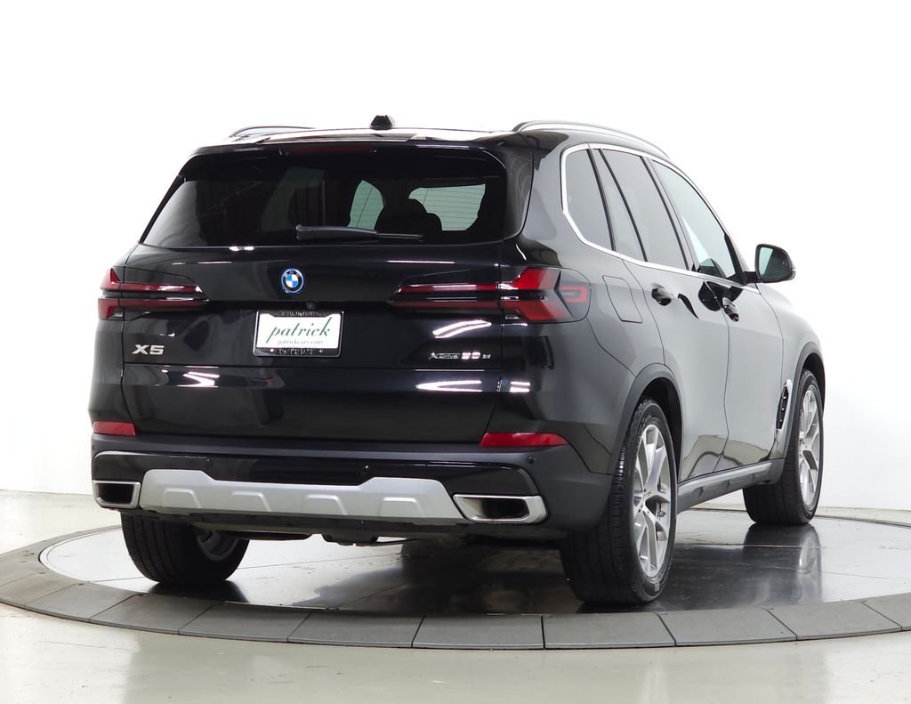 Used 2026 Black Sapphire Metallic BMW xDrive50e image 9