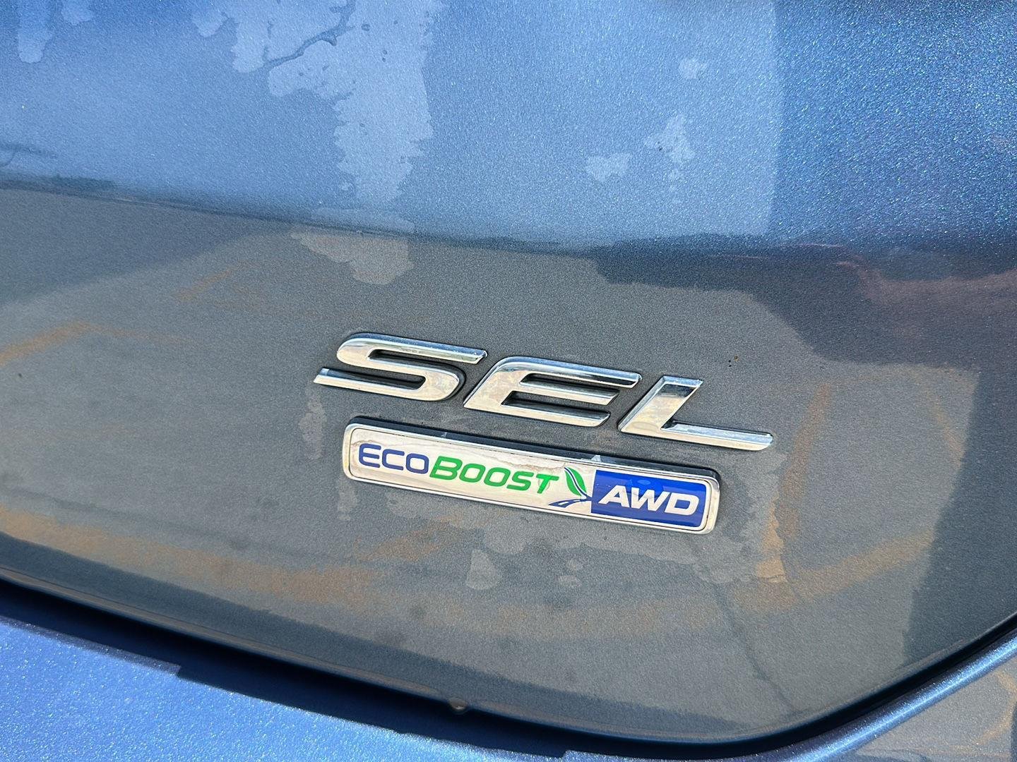 Used 2019 Blue Metallic Ford SEL image 4