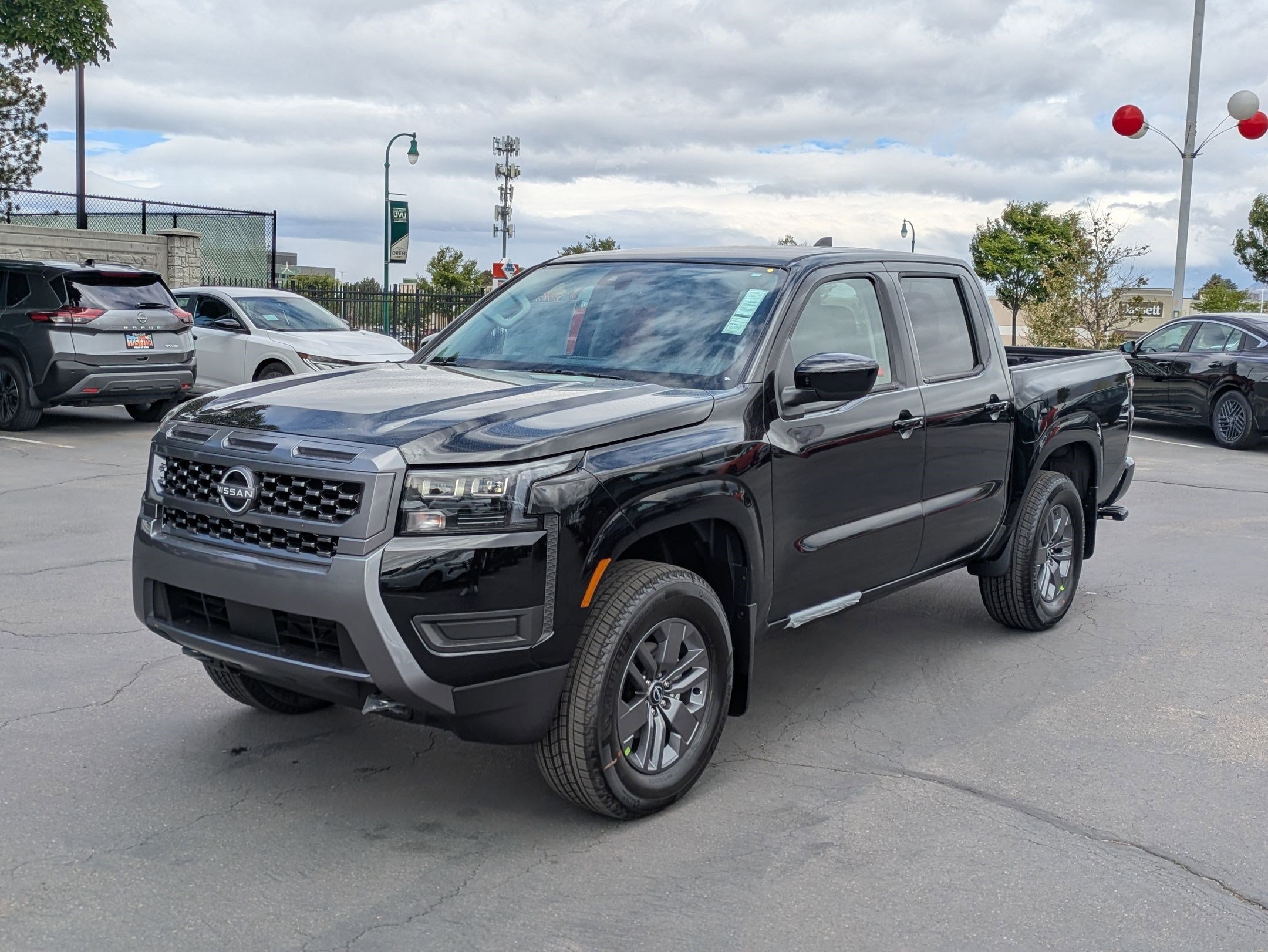 New 2026 Super Black Nissan Crew Cab SV image 8