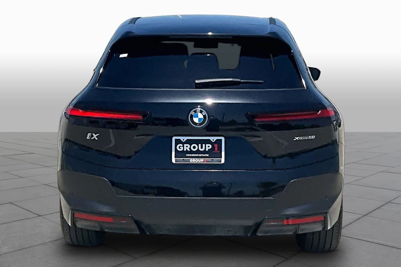 Used 2024 Black Sapphire Metallic BMW xDrive50 image 4