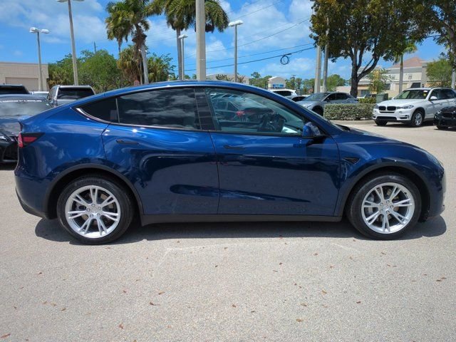 Used 2021 Tesla Model Y Long Range with VIN 5YJYGDEE4MF087256 for sale in Naples, FL