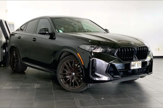 Certified Used 2024 Black Sapphire Metallic BMW xDrive40i image 2