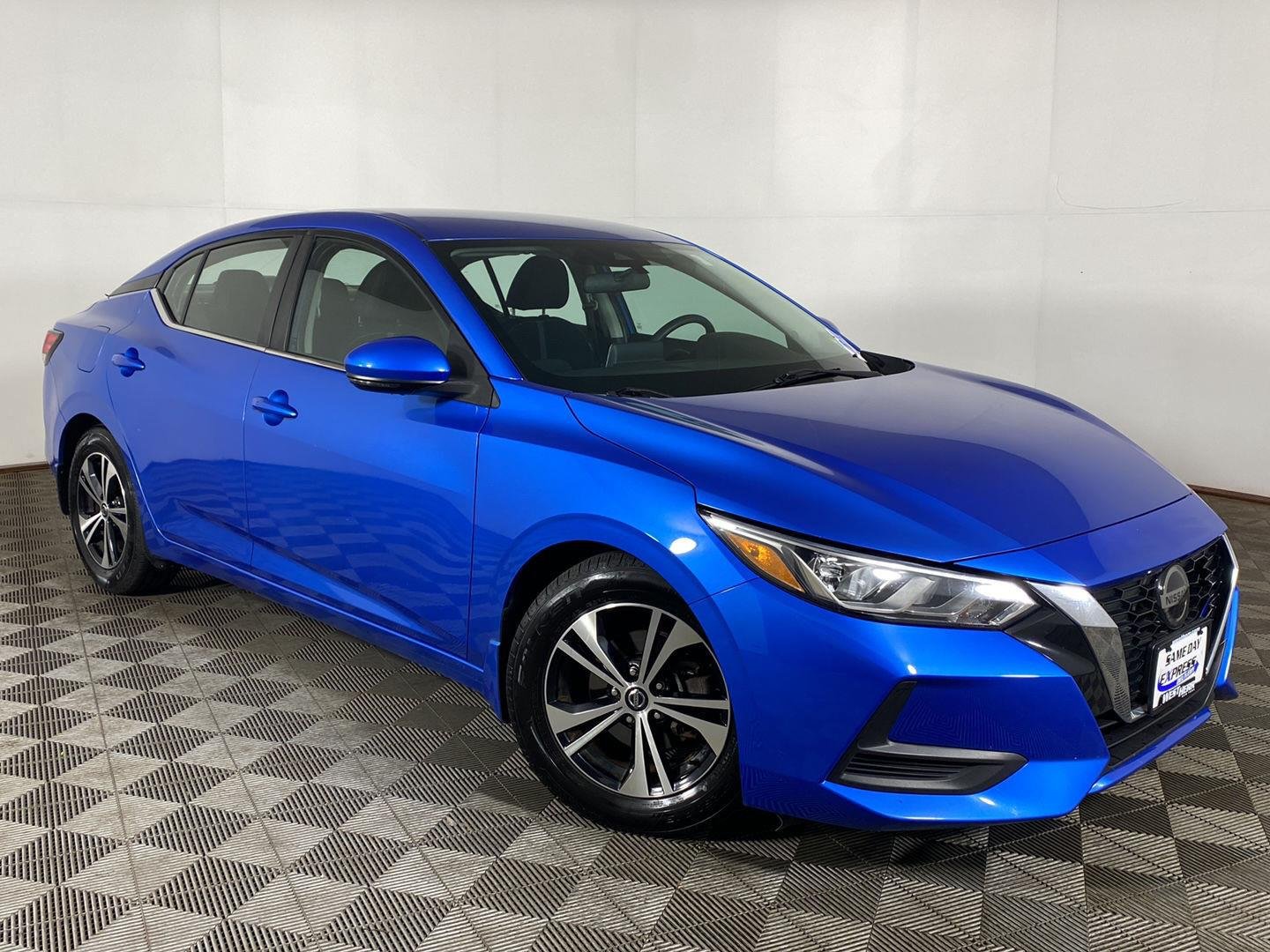 Used 2020 Electric Blue Metallic Nissan SV image 1