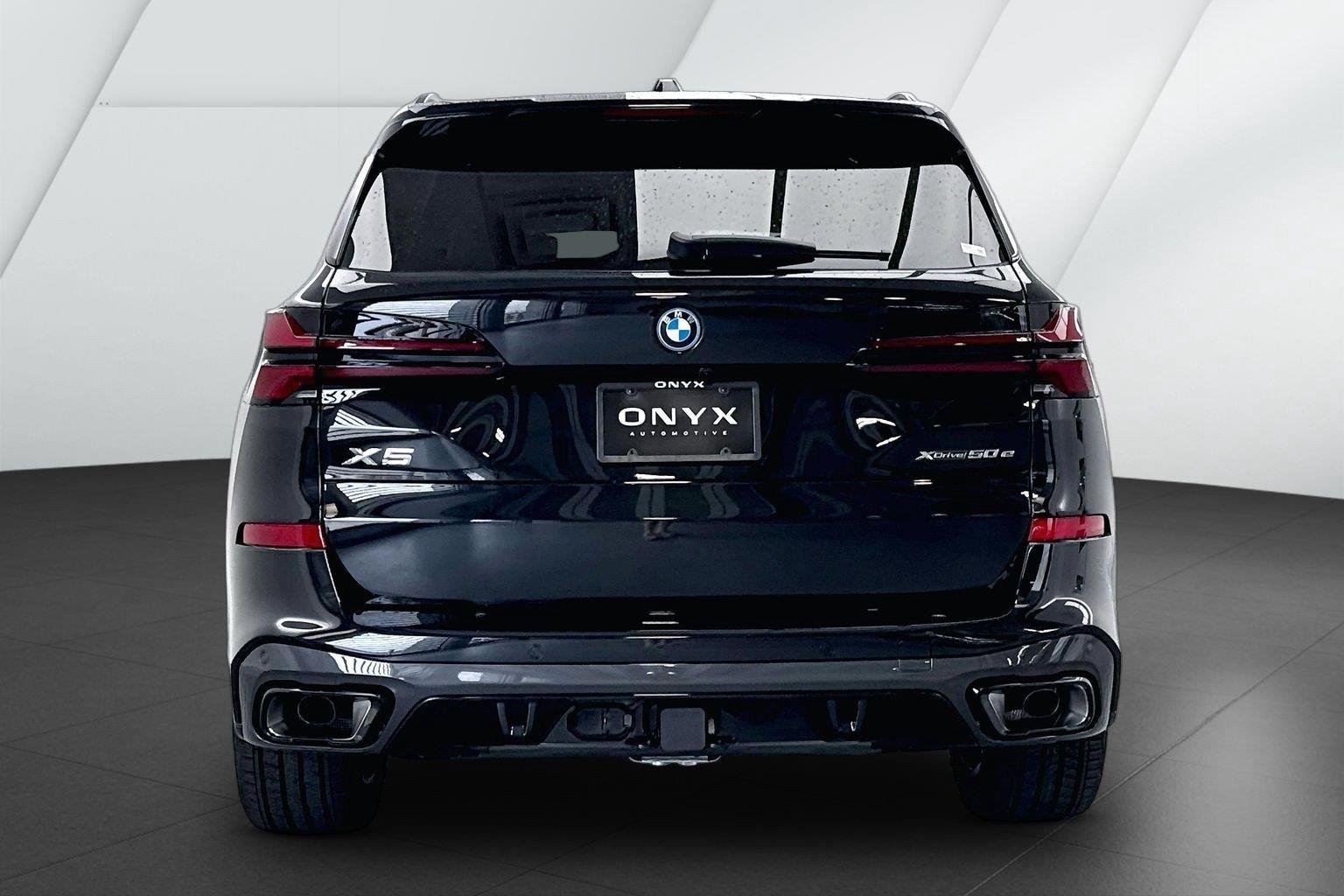New 2026 Black Sapphire Metallic BMW xDrive50e image 7
