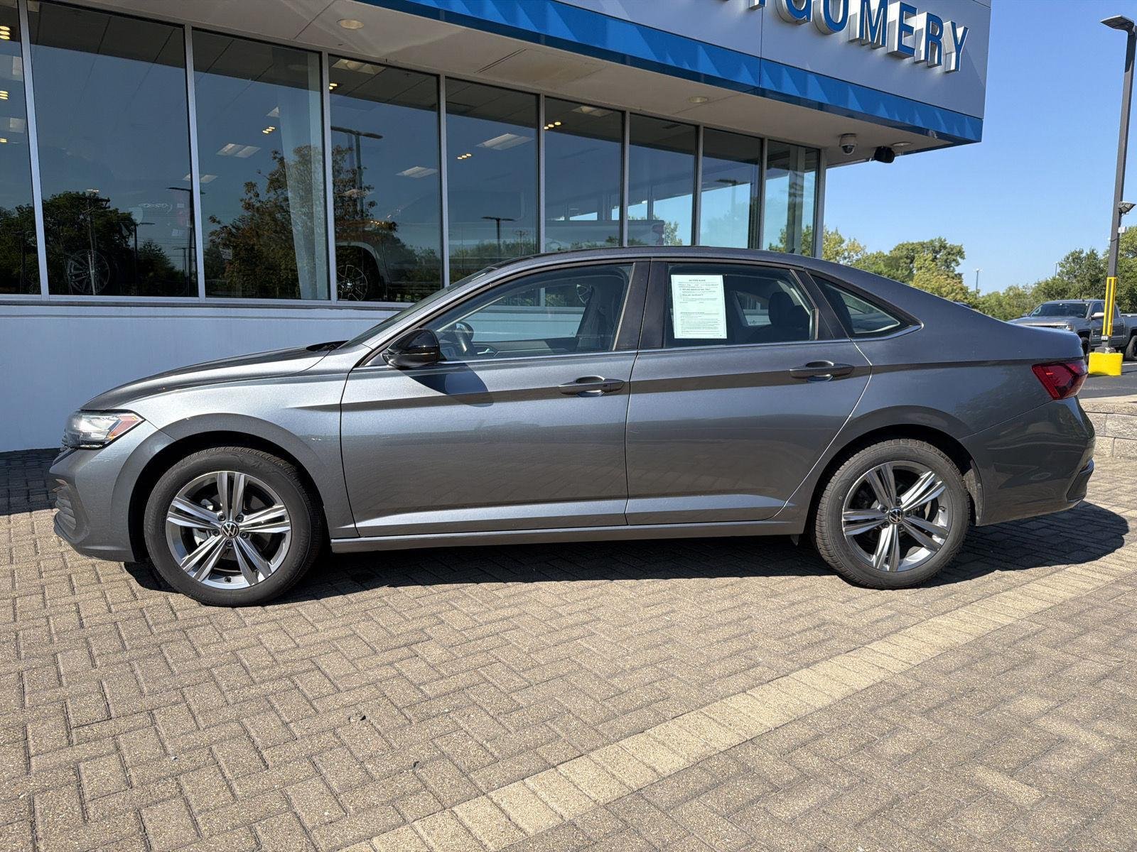 Used 2024 Pyrite Silver Metallic Volkswagen SE image 2