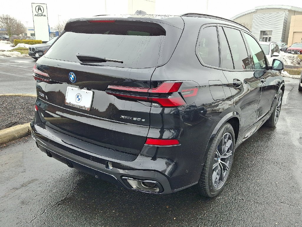 Used 2026 Black Sapphire Metallic BMW xDrive50e image 4