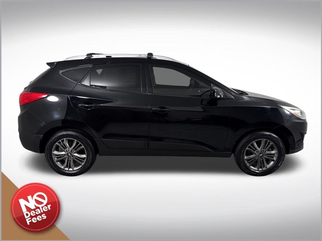 Used 2014 Hyundai Tucson SE with VIN KM8JU3AG7EU928891 for sale in Clermont, FL