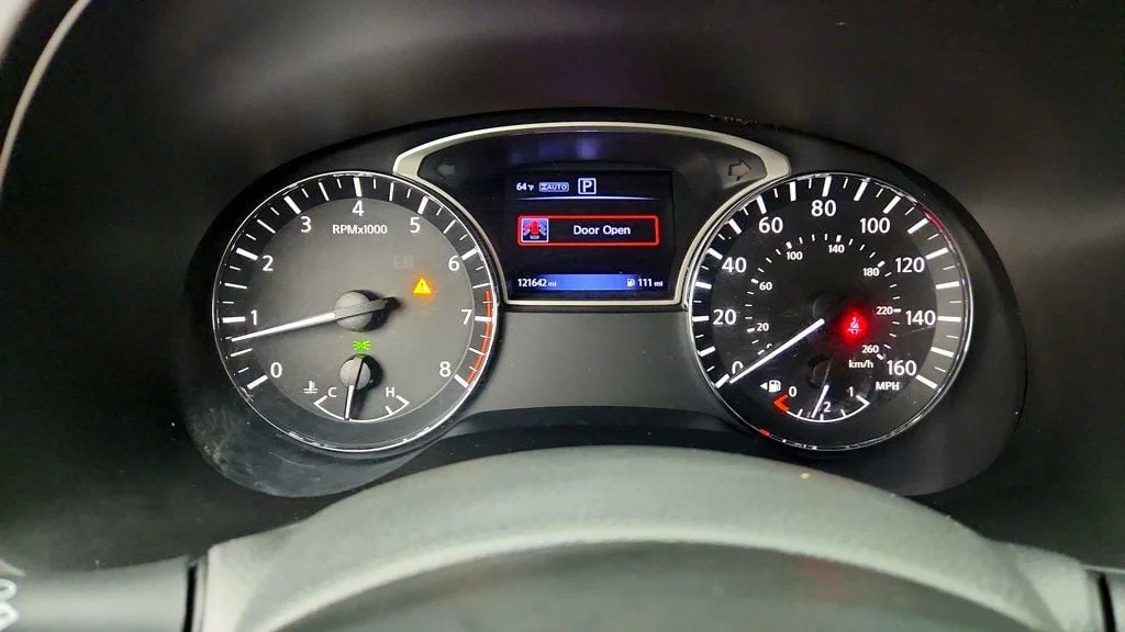 Used 2016 Gun Metallic Nissan 4WD 4dr SV image 13