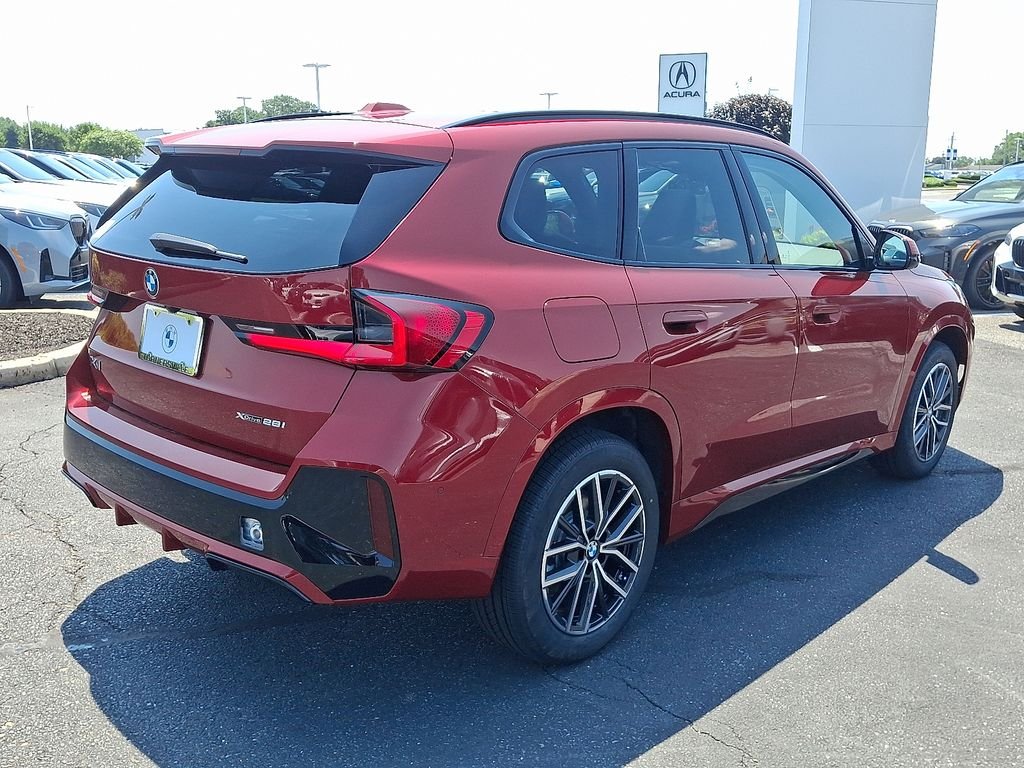 New 2026 Vegas Red Metallic BMW xDrive28i image 4