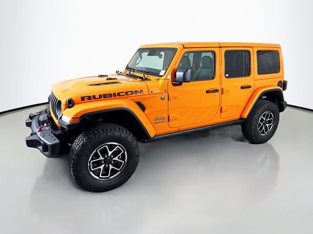 Used 2025 Orange Jeep Rubicon image 3