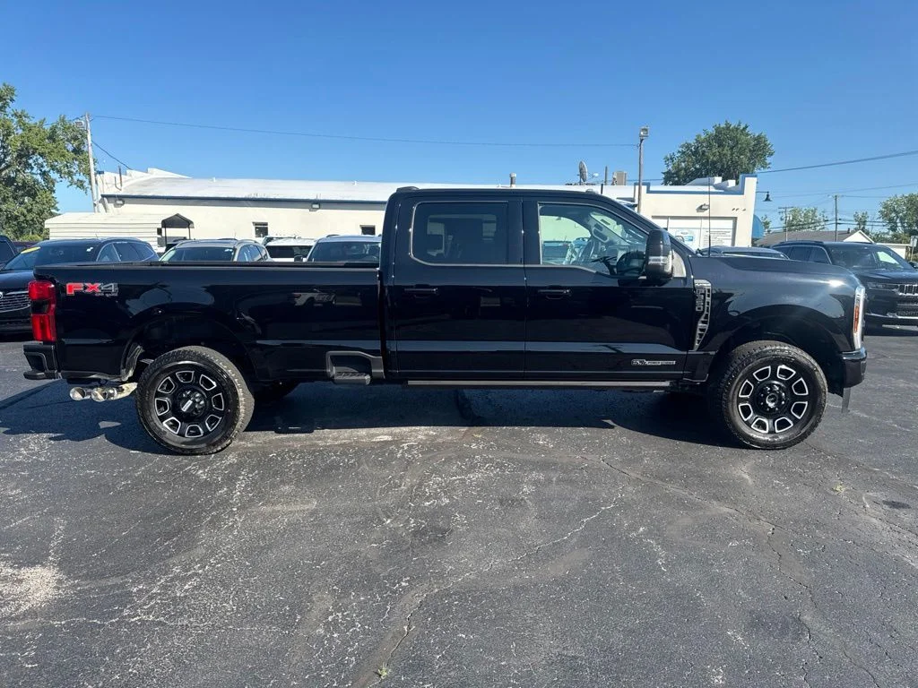 Used 2025 Black Metallic Ford Platinum image 2