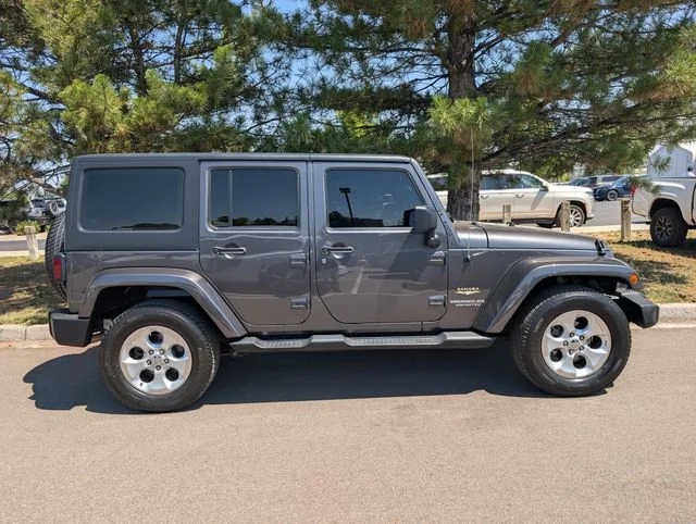 Used 2014 Jeep Wrangler Unlimited Sahara with VIN 1C4HJWEG3EL168519 for sale in Casper, WY