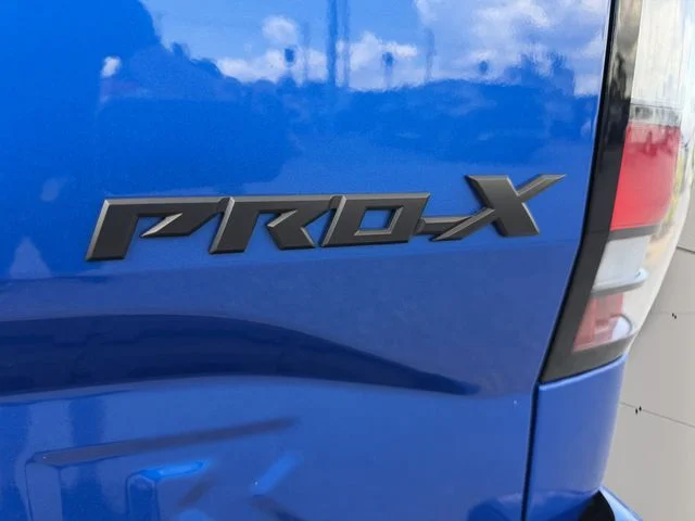 Certified Used 2024 Blue Nissan PRO-X image 13