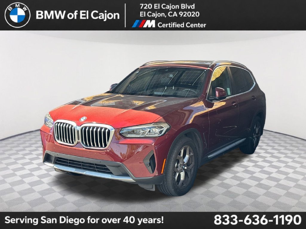 Used 2023 Red Metallic BMW sDrive30i image 1