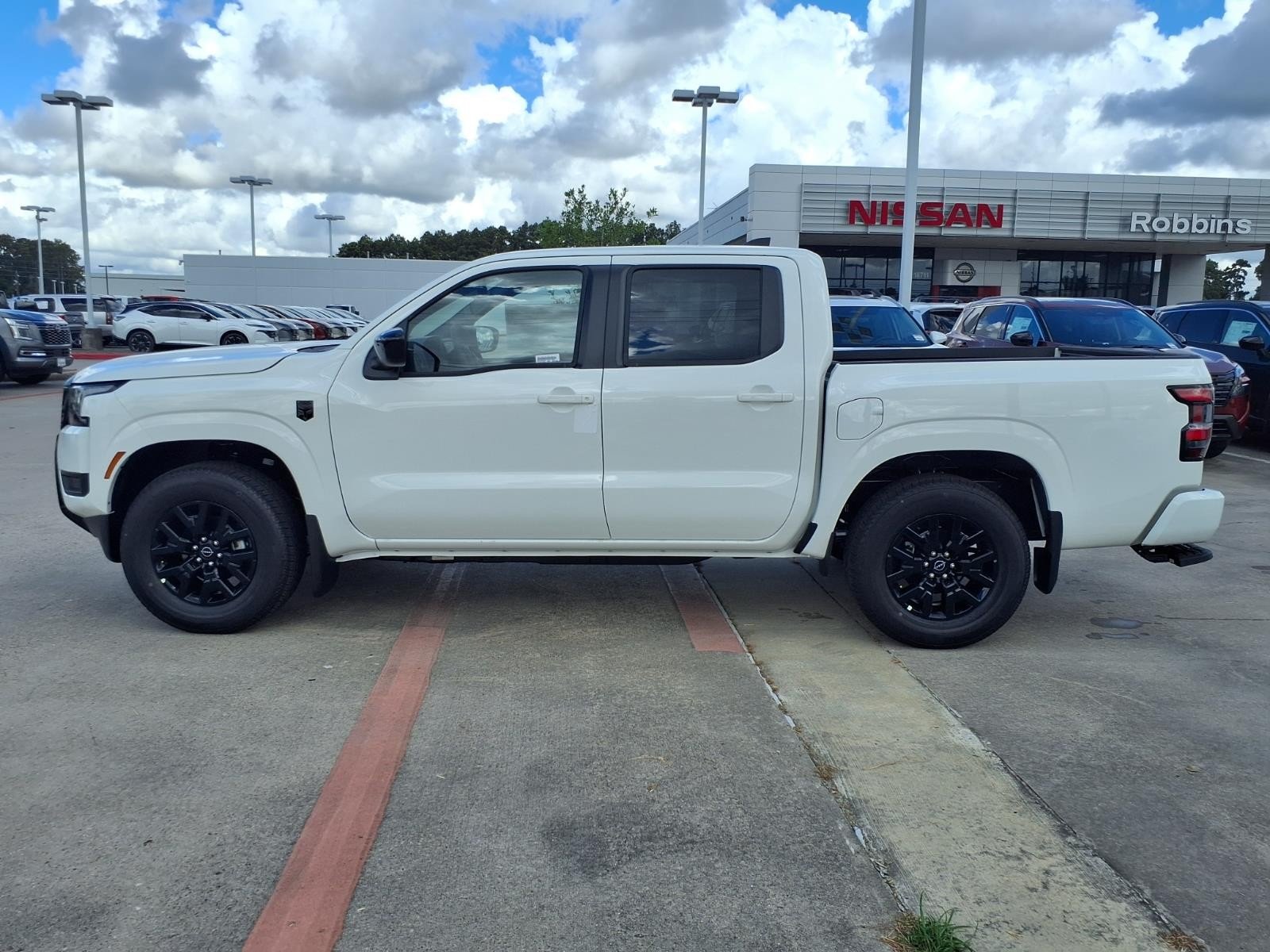 2026 Nissan Frontier Crew Cab SV White at Robbins Nissan