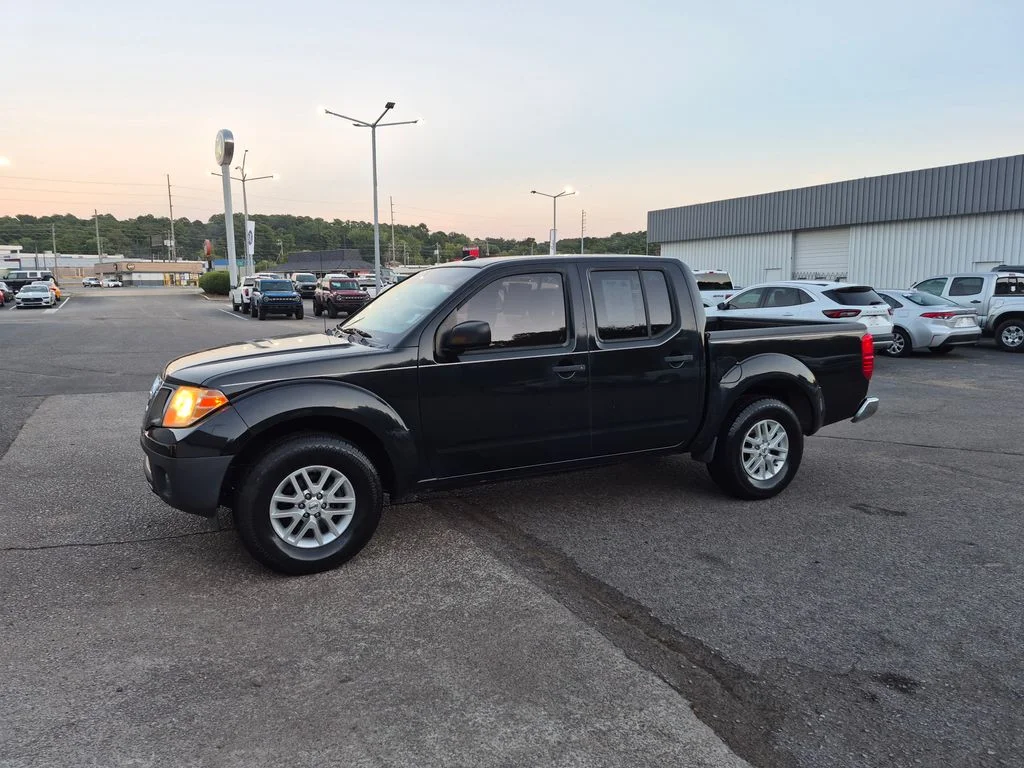 Used 2016 Magnetic Black Nissan SV image 2
