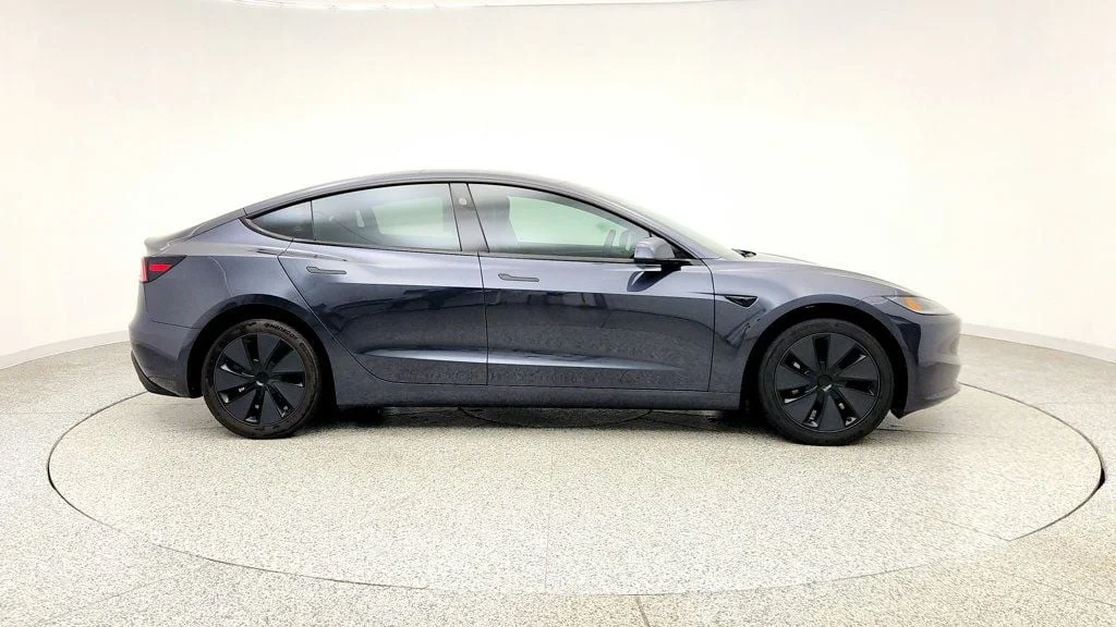 Used 2025 Stealth Grey Tesla Long Range AWD image 4