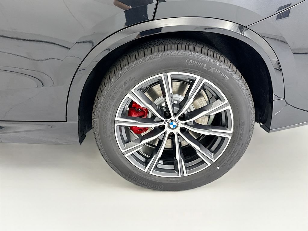 New 2026 Black Sapphire Metallic BMW xDrive50e image 30