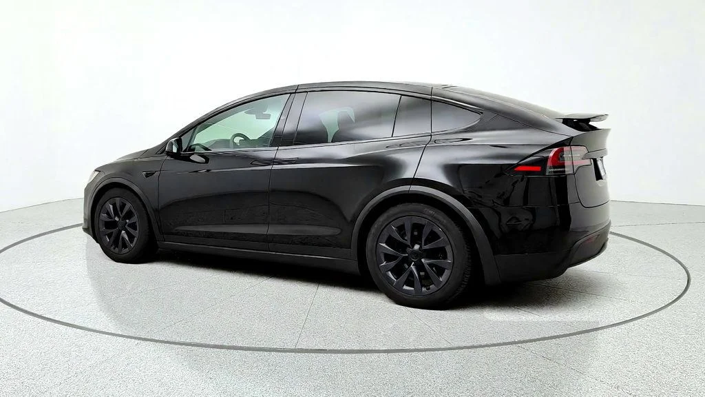 Used 2023 Solid Black Tesla AWD image 7